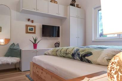 3_tyrol_purelife_lodges_schlafzimmer.jpg